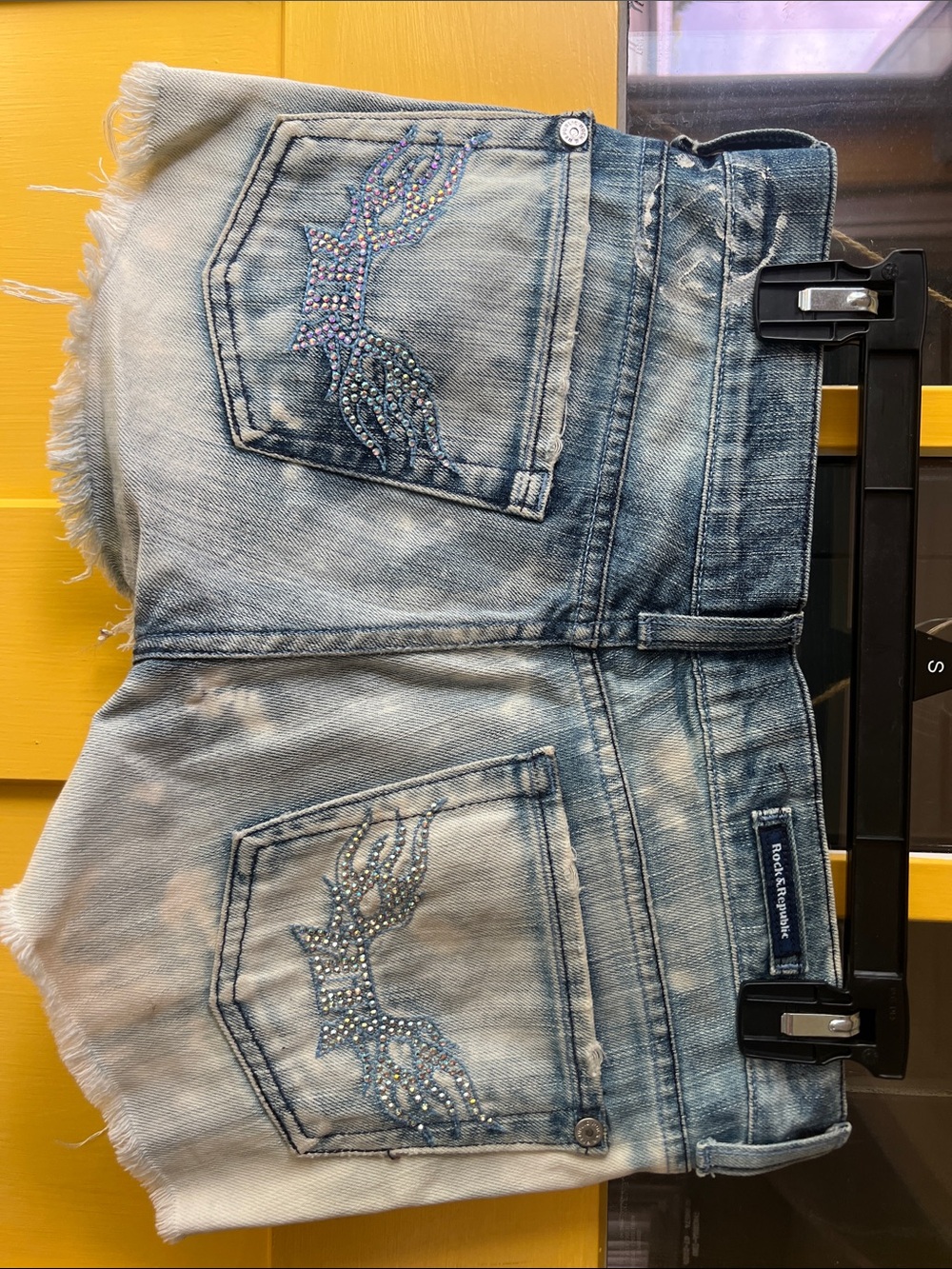 Rock & Republic Light Blue Denim Shorts with Rhinestone Wing Pockets